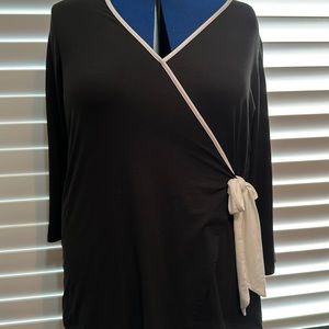 Black cotton blouse with white accent and bow. 3/4 sleeves